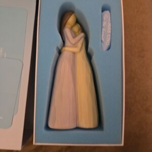 Embracing Figurine in Pastel Hues